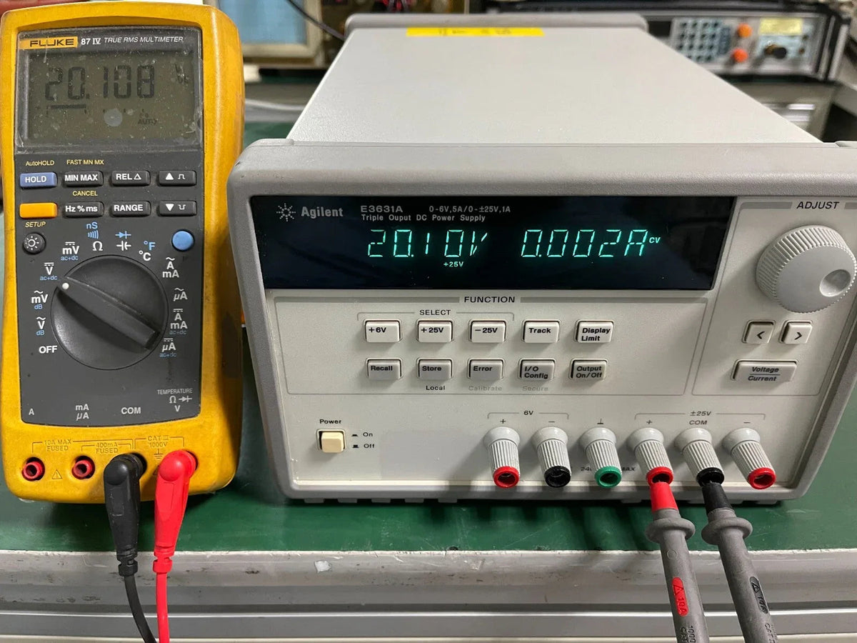 HP Agilent E3631A Triple Output 0-6V/5A 0-25V/1A PSU