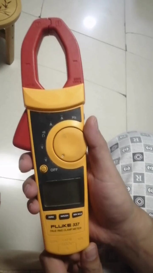Used Fluke 337 True RMS AC/DC Clamp Meter