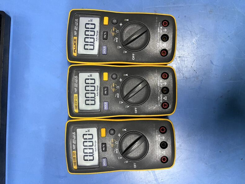 Used Fluke 107 Handheld AC/DC Digital Multimeter