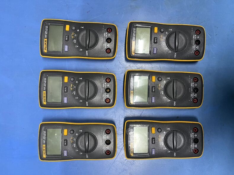Used Fluke 107 Handheld AC/DC Digital Multimeter