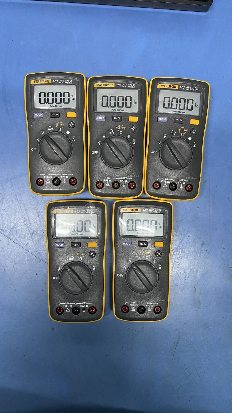 Used Fluke 107 Handheld AC/DC Digital Multimeter
