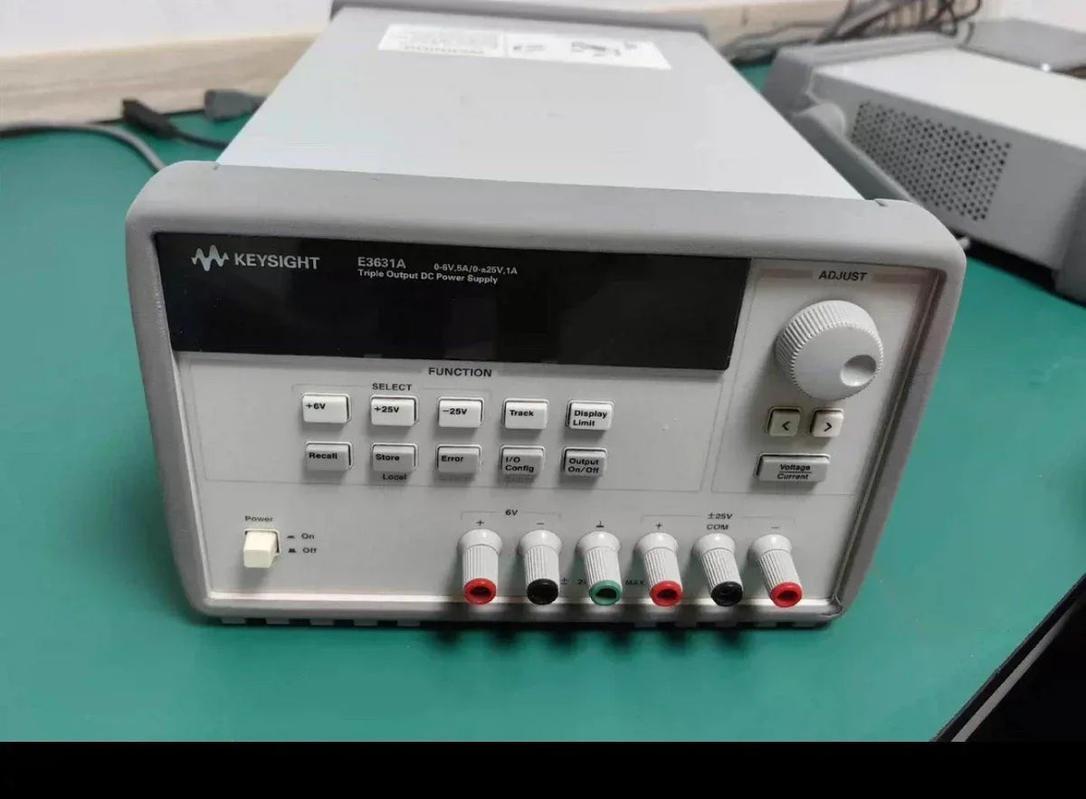 Agilent E3631A Triple Output 0-6V/5A DC Power Supply